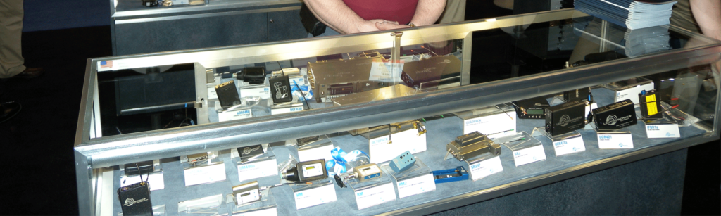 A person standing in front of some electronic equipment.