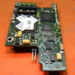 A close up of the bottom side of an electronic device.